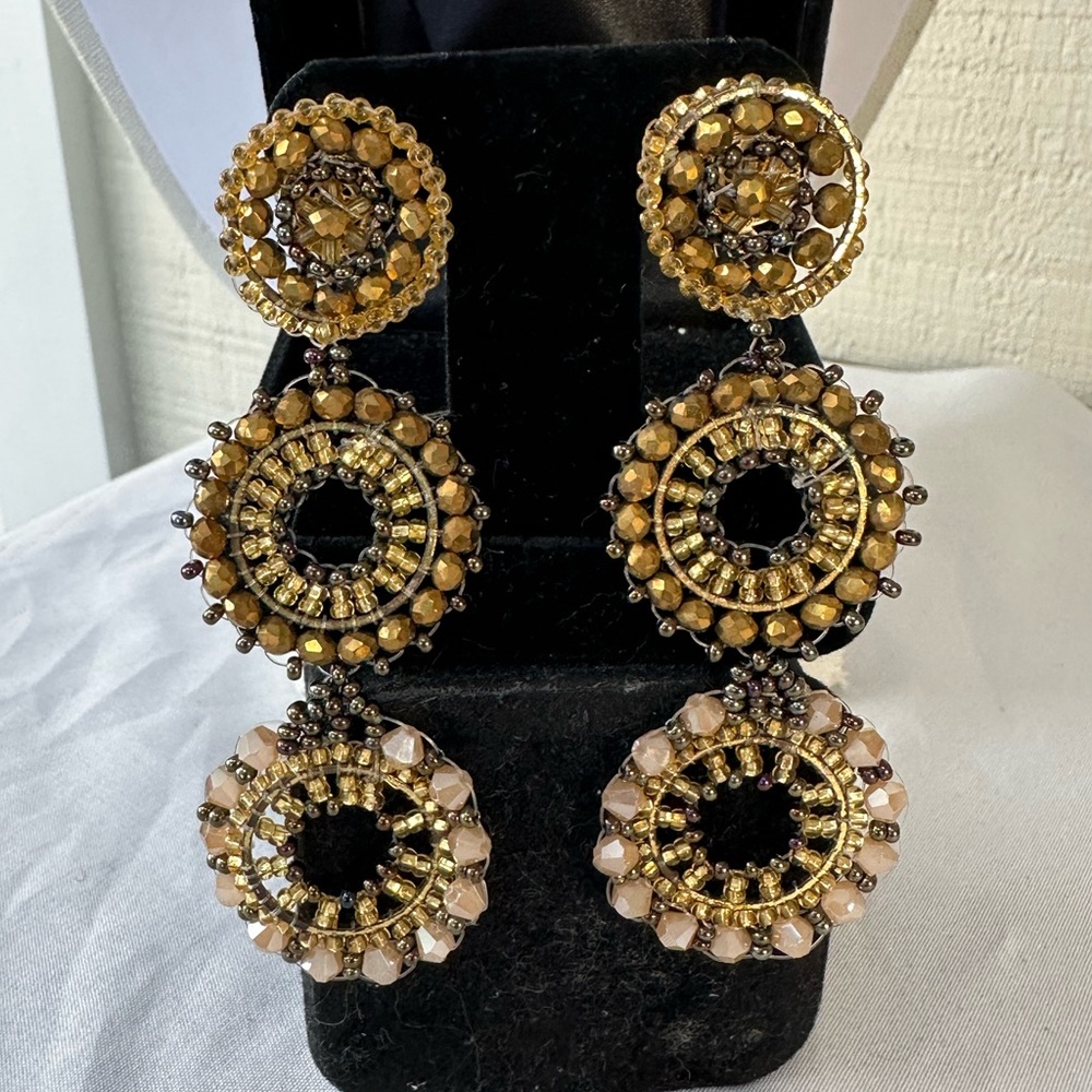 Long sparkly goldtone connected circles earrings